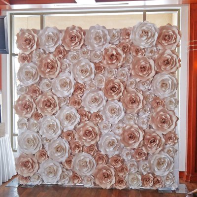 Backdrop entirely filled with the paper flowers.