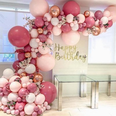 Balloons cascade with flowers decor.