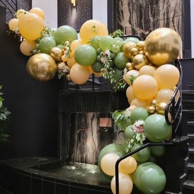 Balloons cascade with flowers décor.
